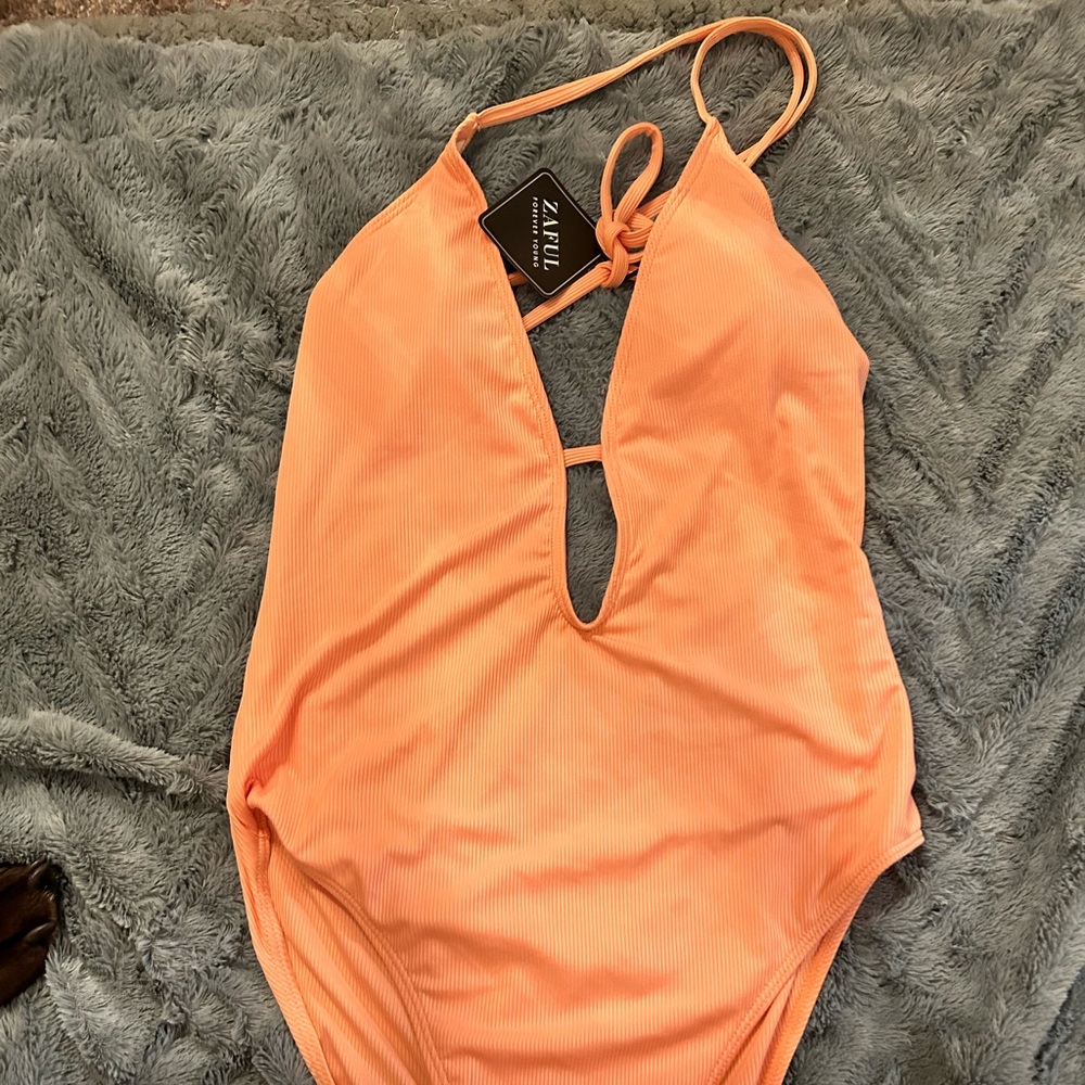 Peach one piece swim suit